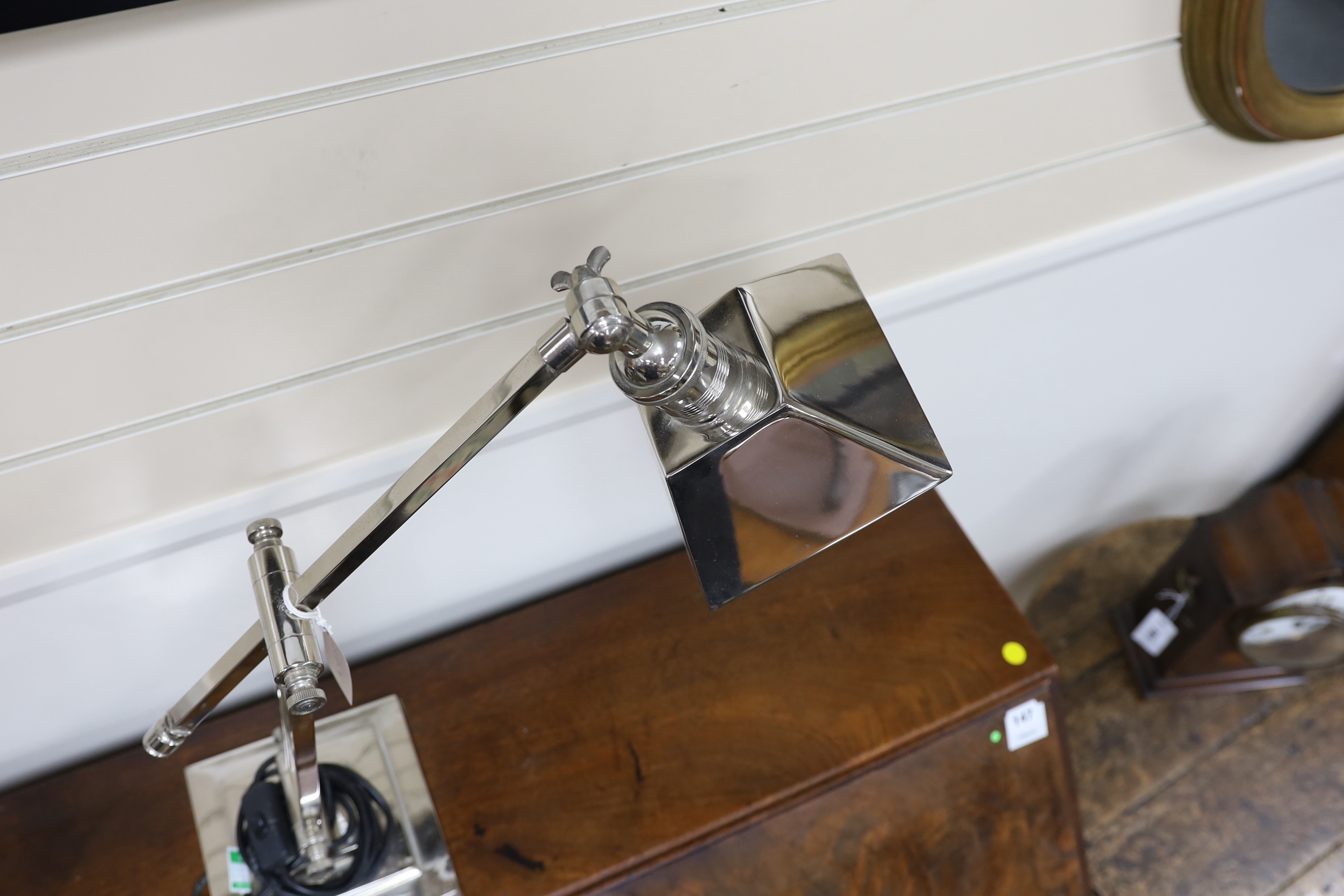 A chrome plated Art Deco style angle poise desk lamp